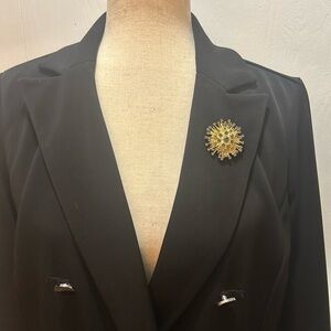 Radiant Gold and green Rhinestone Starburst Brooch